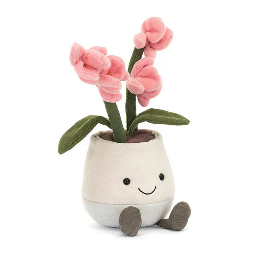 Soft pink Amuseables Orchid plush toy by Jellycat with expressive eyes and a smiling face, perfect for playtime.