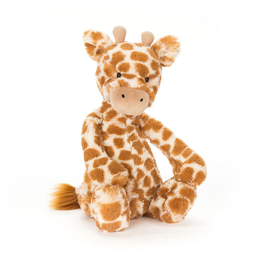 Soft medium Bashful Giraffe toy by Jellycat with a cuddly texture and friendly expression, perfect for playtime.