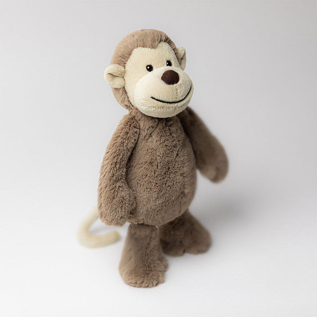 Soft Bashful Monkey Medium plush toy by Jellycat, with a cuddly monkey character and light brown fur, perfect for play and cuddling.