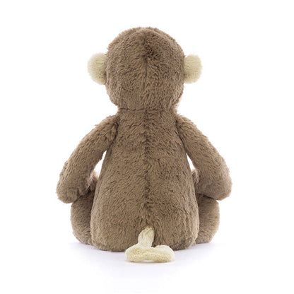 Medium Bashful Monkey plush toy from Jellycat, featuring soft fabric and a cute monkey face, perfect for cuddling.