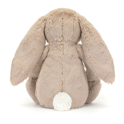 Medium Blossom Beige Bunny "Petal" Jellycat plush toy with soft fabric and adorable bunny design, perfect for cuddling.